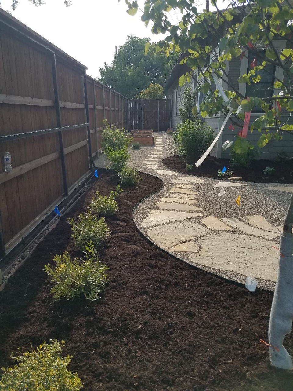 flagstone path and raised beds