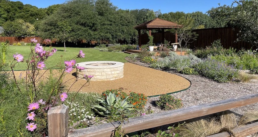 xeriscaped native plants and fire pit