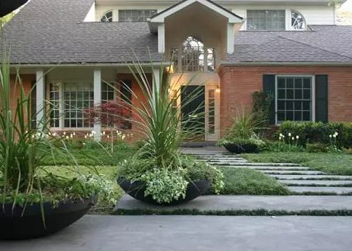 Large containers add drama and curb appeal.